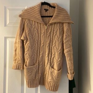 Cozy Talbot’s wool-blend sweater coat. Zips